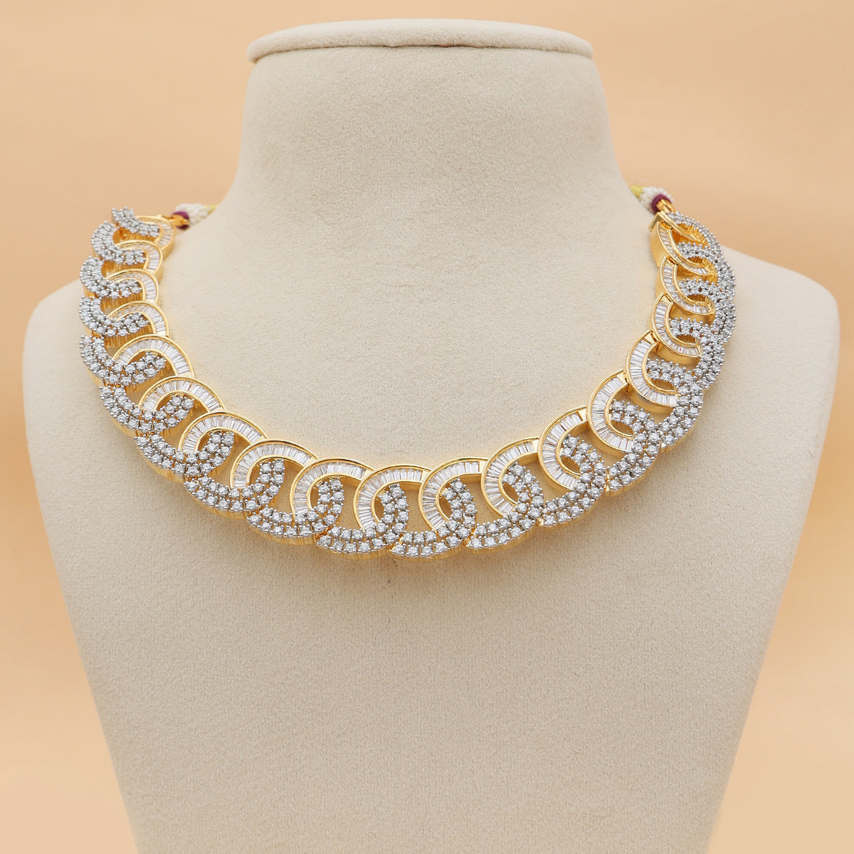 Gold-Toned American Diamond Swirl Design Necklace & Earrings Set