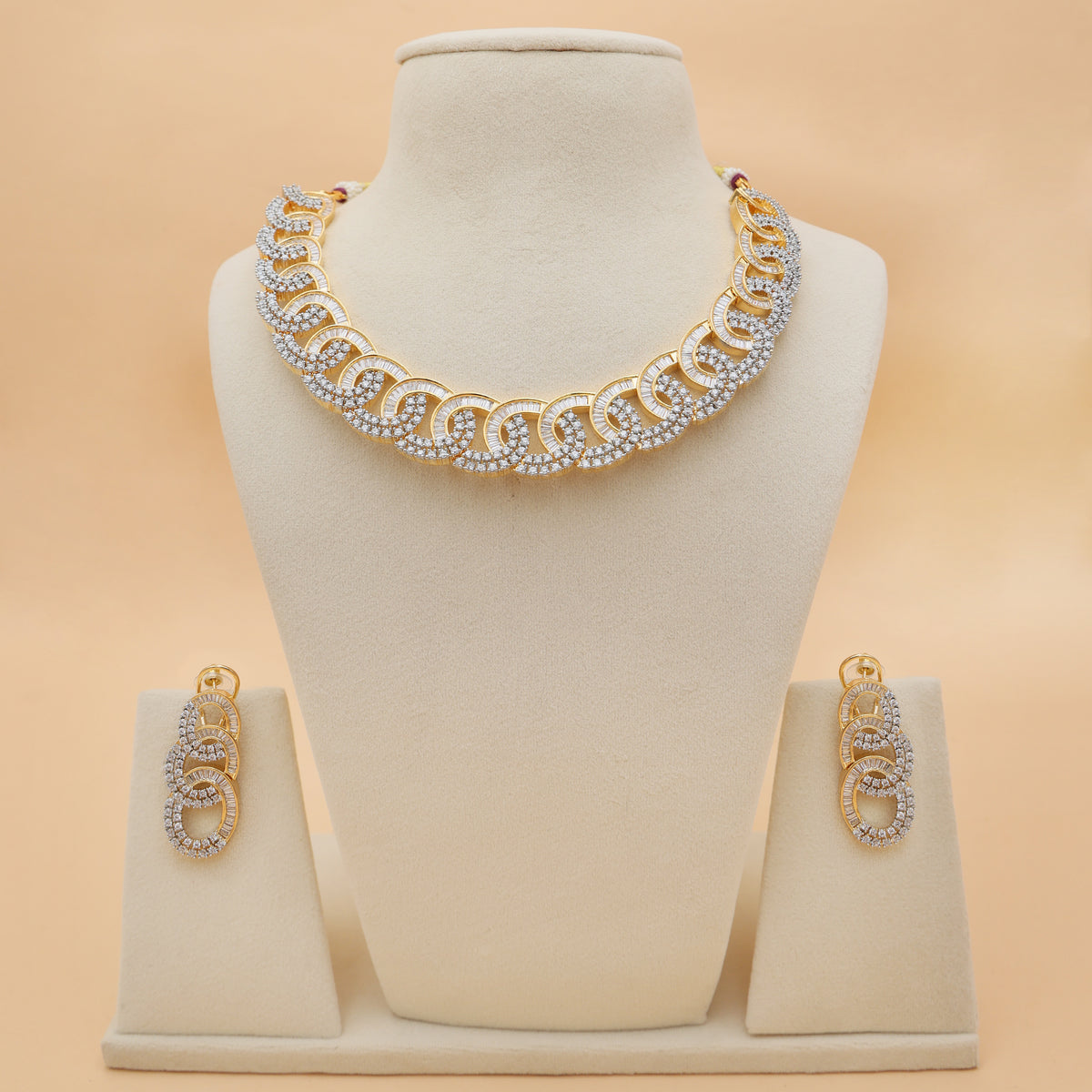 Gold-Toned American Diamond Swirl Design Necklace & Earrings Set
